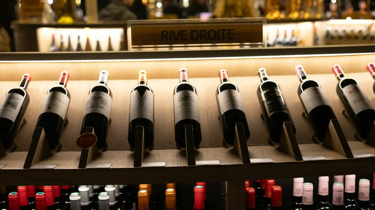 Shelves of wine bottles in a shop