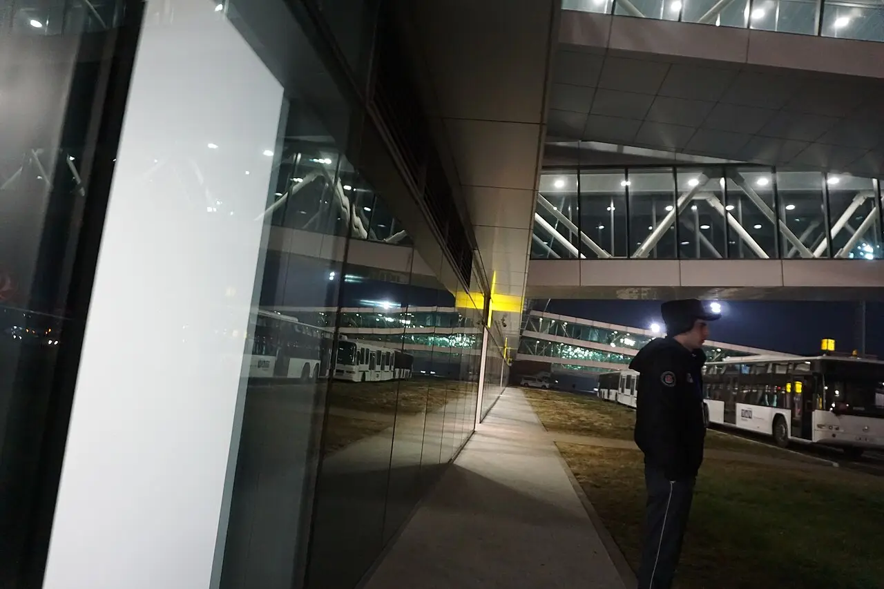 The arrivals hall of Tbilisi airport with passengers