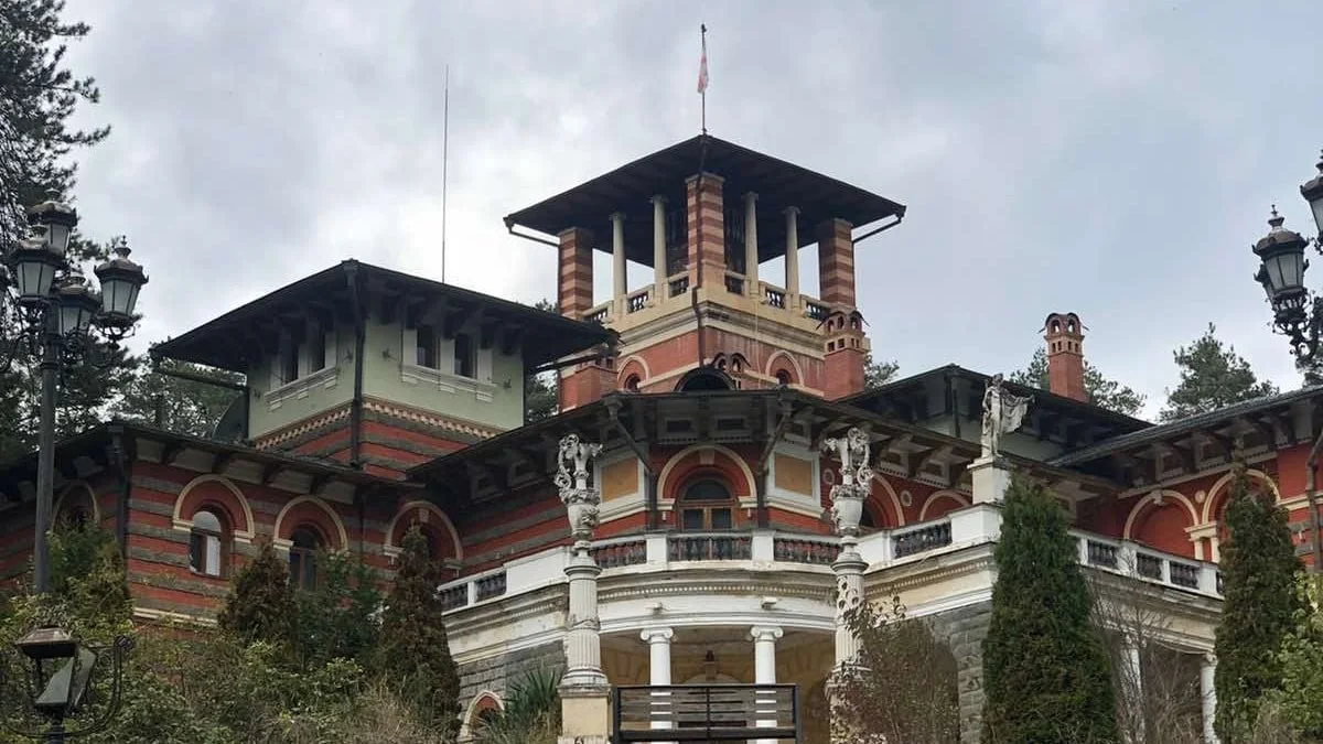 The striped brick facade, terrace and tower of the Romanov palace at Likani