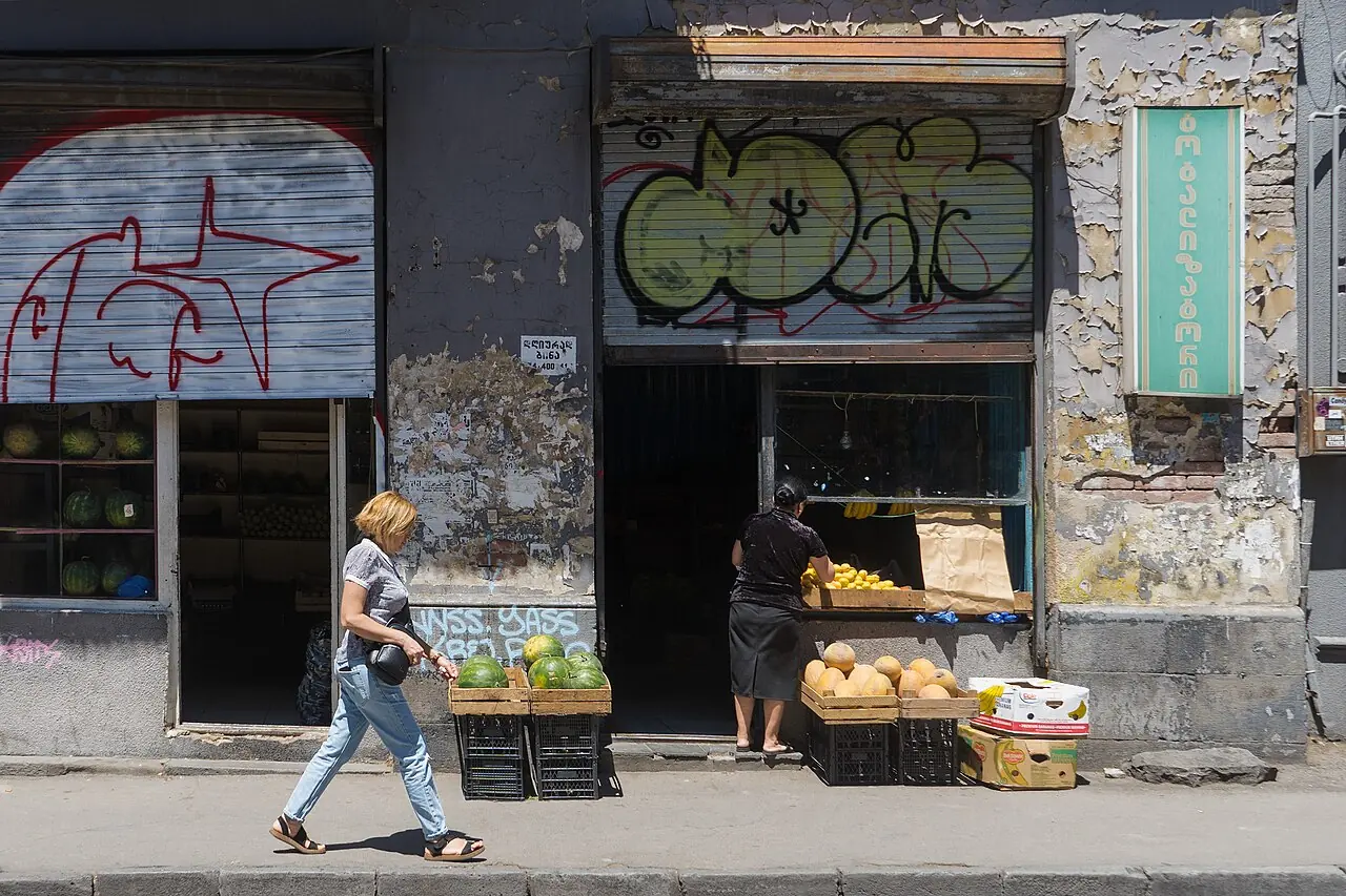 A greengrocer with watermelons on the pavement of Marjanishvili Street