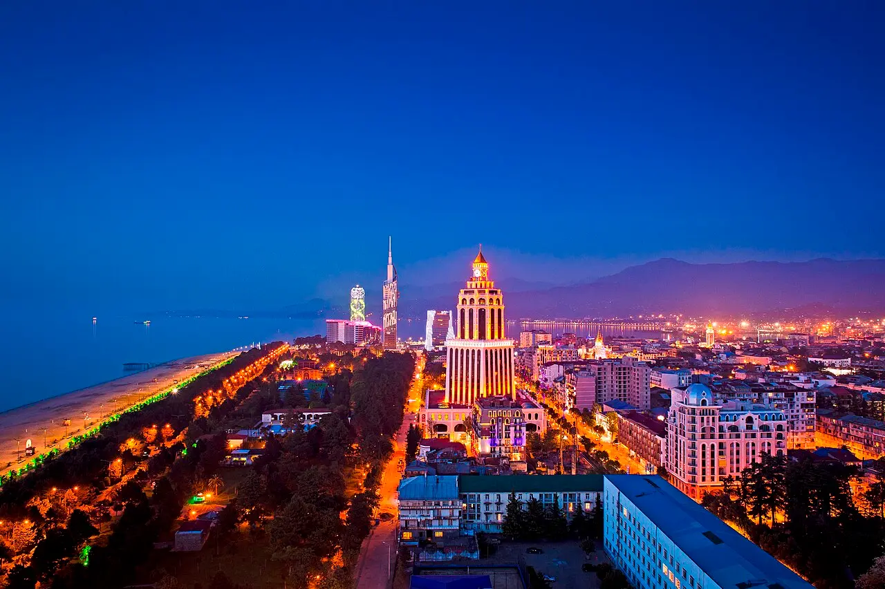 Night panorama of Batumi with lit-up hotels and the seafront