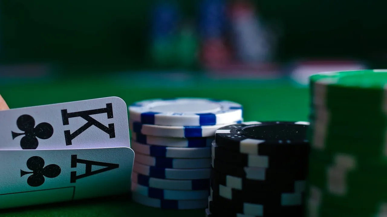 Cards, chips and dice on a casino gaming table