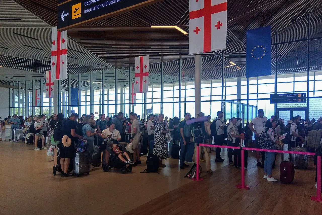 A queue of passengers in the Kutaisi airport terminal