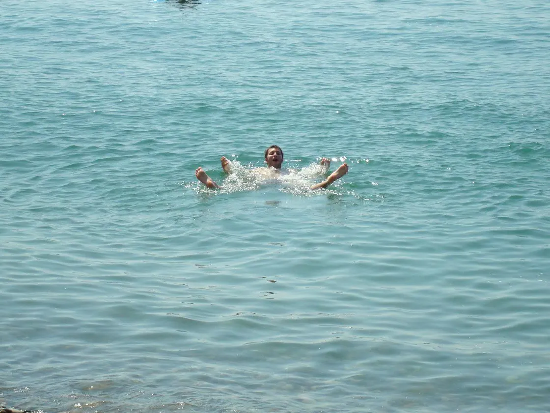 Swimming in the clear water at Gonio