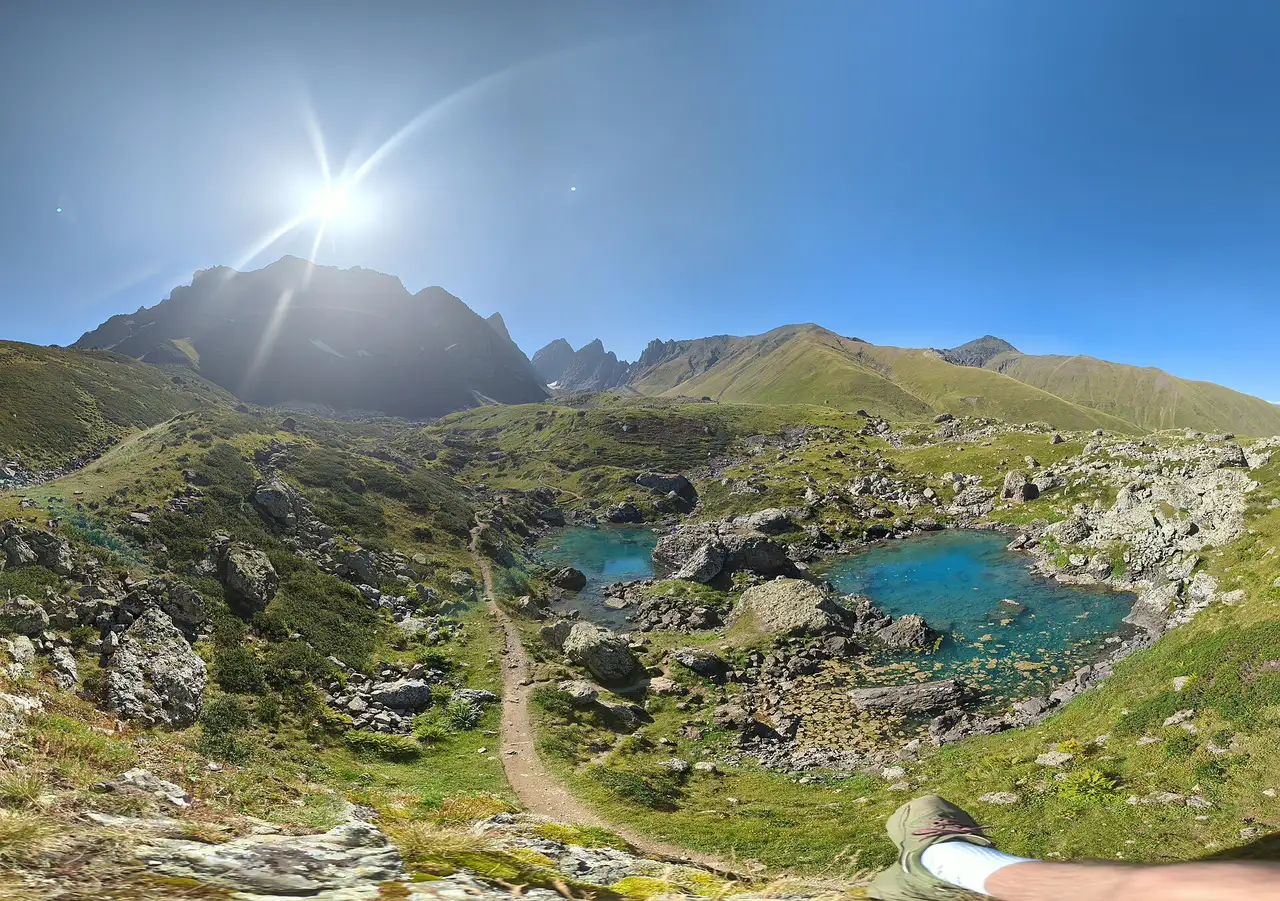 A turquoise Abudelauri lake below the Chaukhi massif