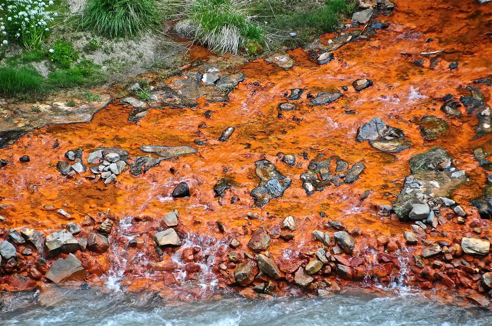 Orange travertines and mineral springs in the Truso valley