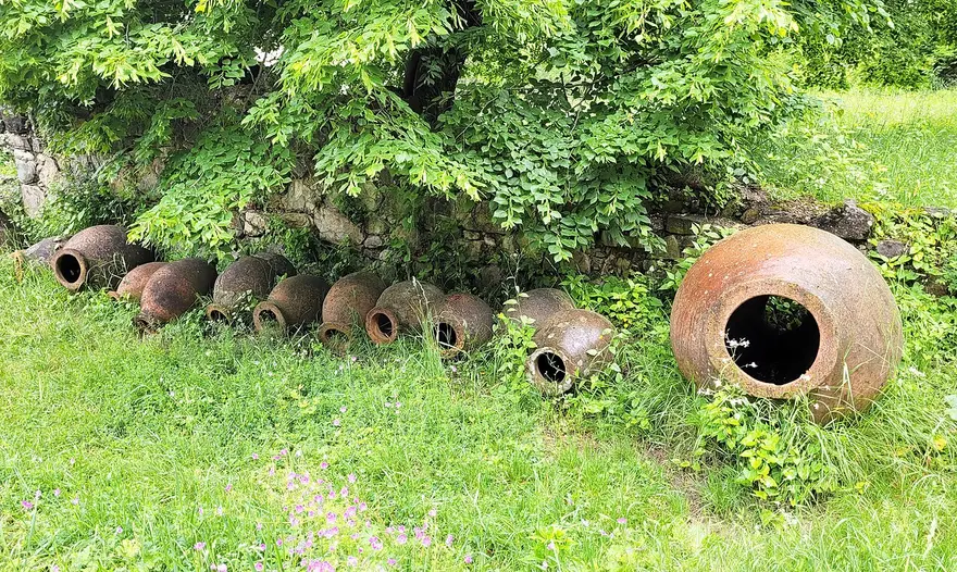 Buried qvevri clay jars in the ground at Ikalto monastery near Telavi