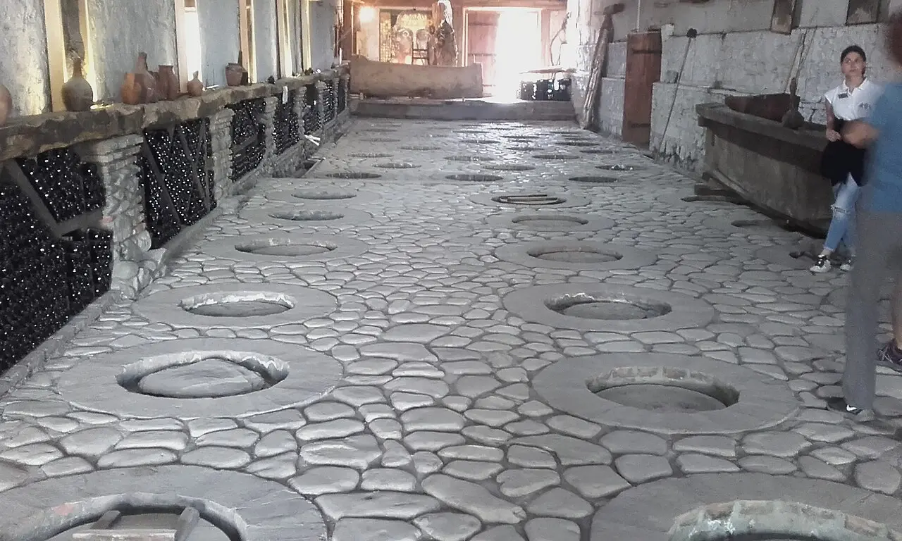 Hall of buried qvevri clay vessels at Kindzmarauli Marani in Kvareli, Kakheti