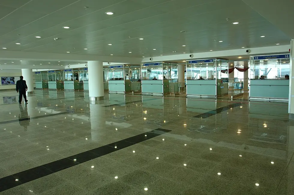 Passport control desks in an airport arrivals hall