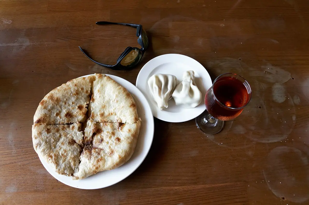 A Georgian table with khachapuri and khinkali