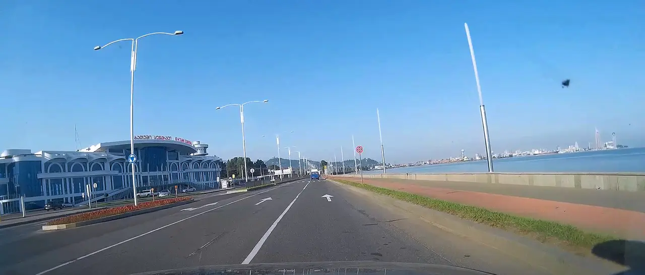 The S2 coastal road arriving in Batumi, with the Black Sea and city skyline