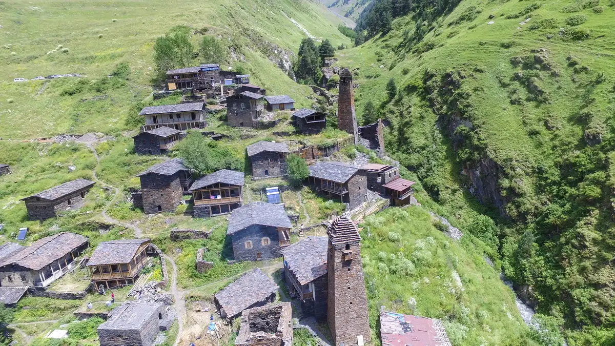 Slate houses and stone towers of Dartlo village from above