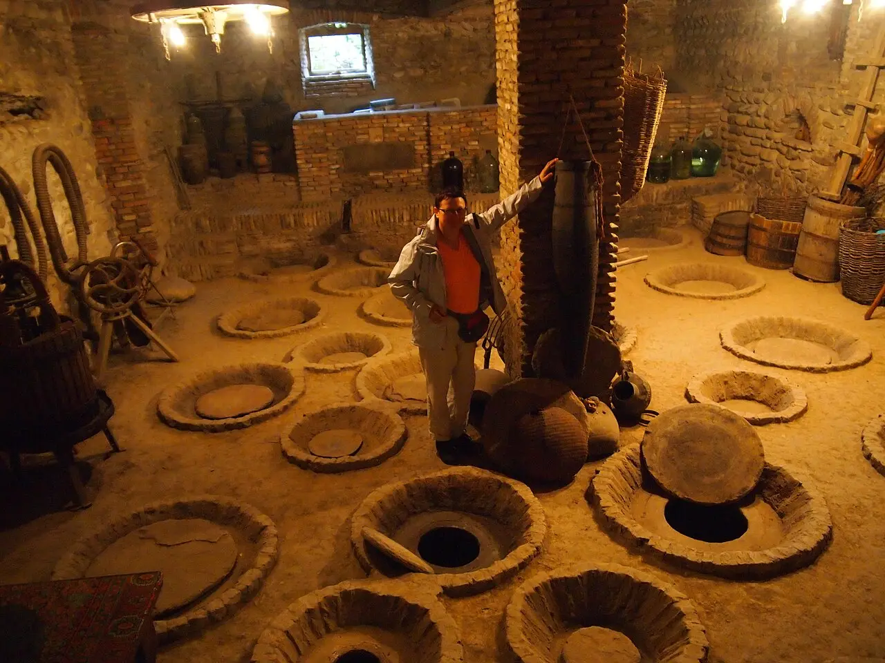 Clay qvevri buried in the floor of a Kakheti winery